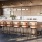a kitchen with a bar and stools
