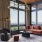 a room with a couch and chairs