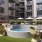 a hot tub with chairs around it