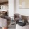 a lounge with a large painting