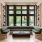 a large green couch with large windows