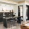 a kitchen with black cabinets